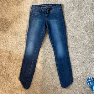 Low rise medium wash skinny jeans